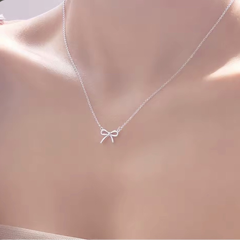 Sterling Silver Delicate Bow Pendant Necklace
